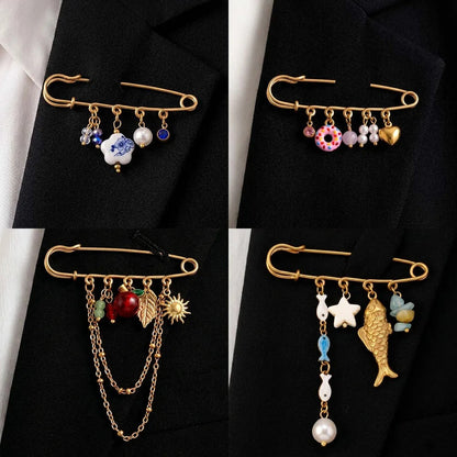 Charmed safety pins